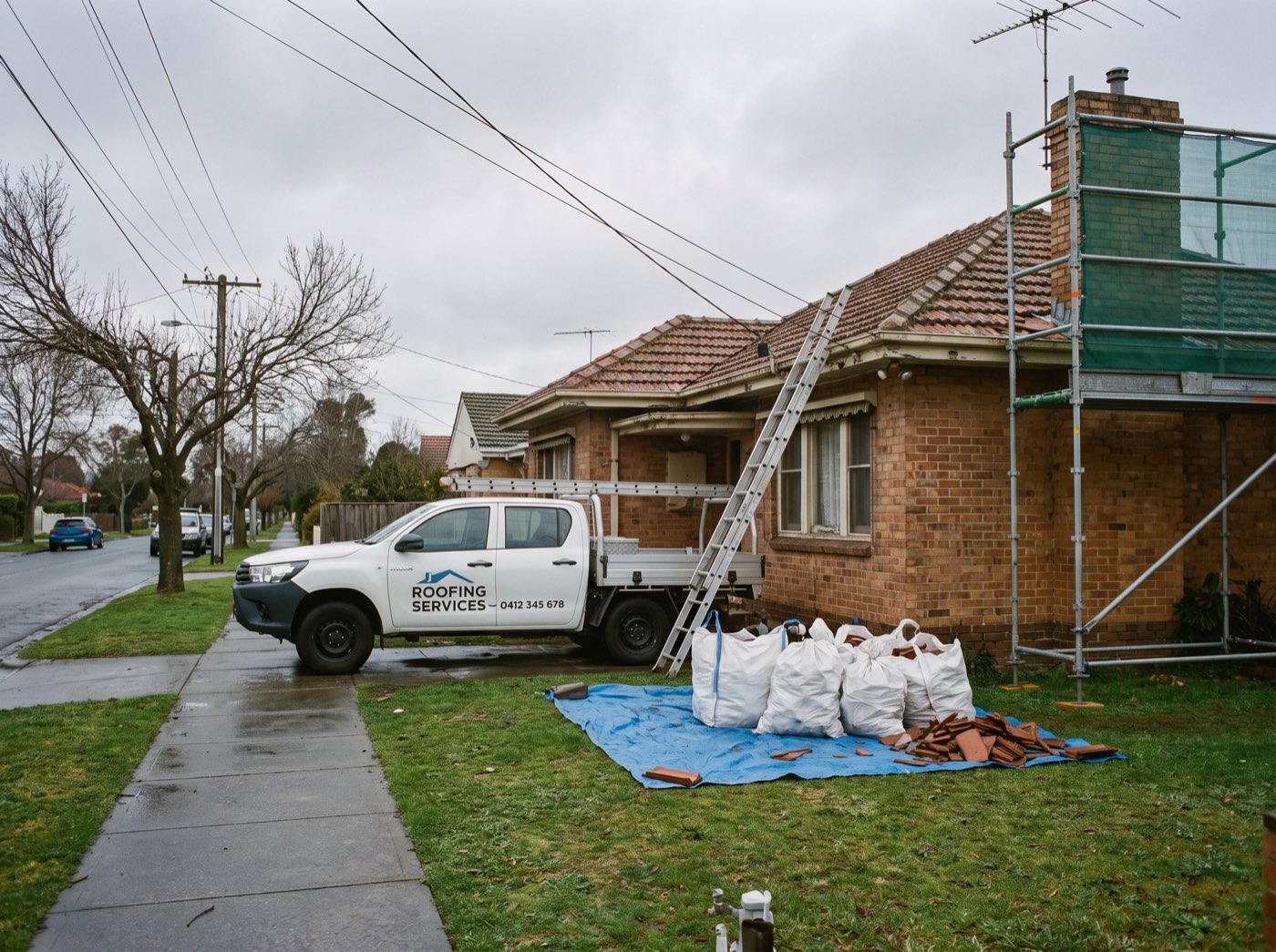 A roofing job under way outside a Melbourne home