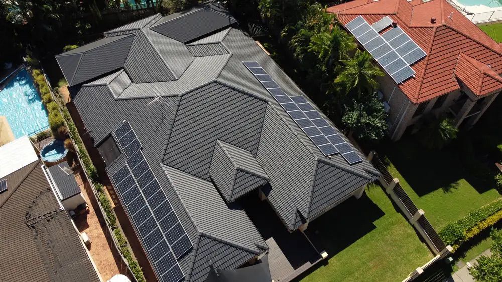 Drone shot of a finished charcoal tile roof restoration