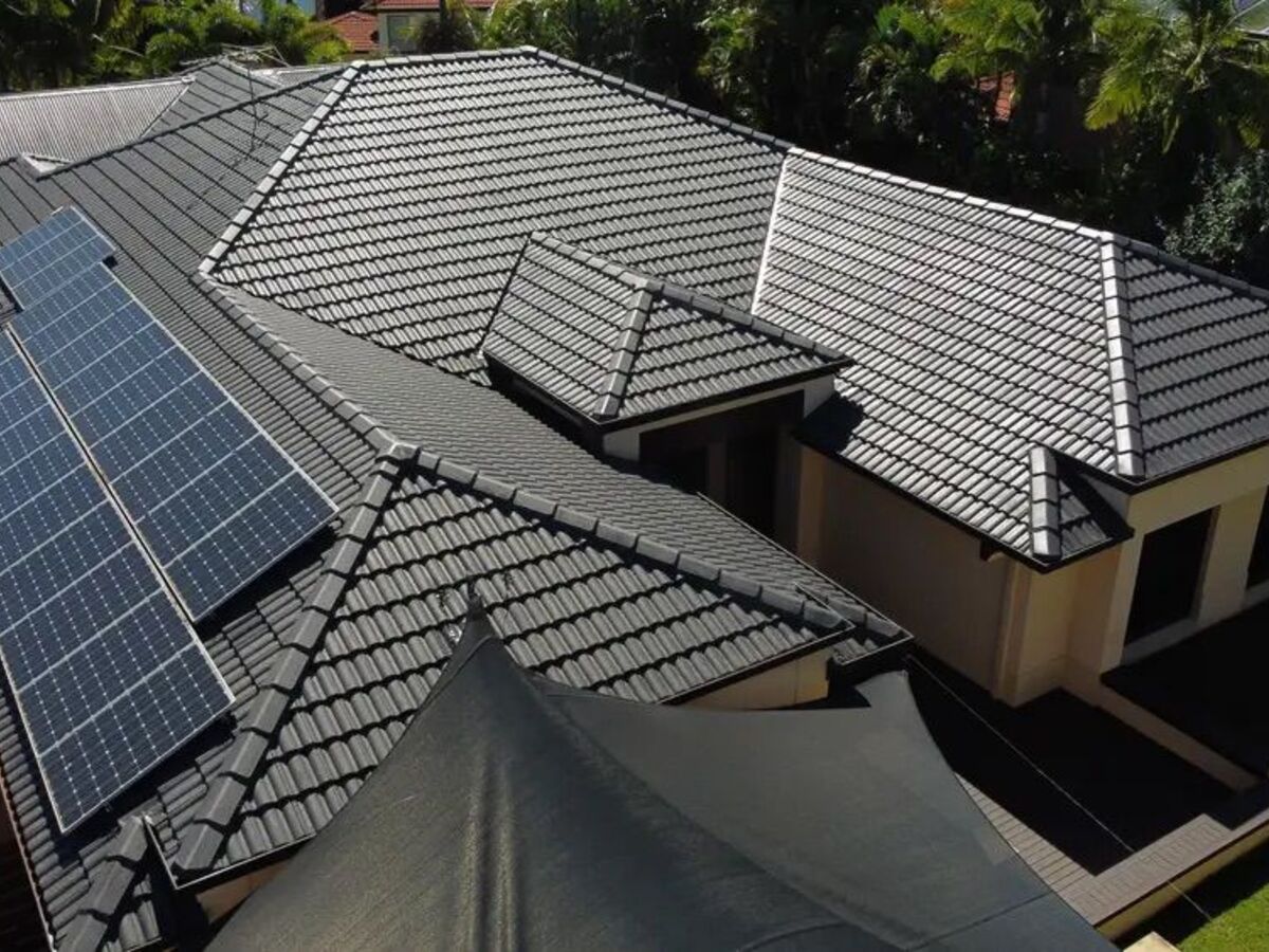 The finished roof in charcoal, seen from a drone